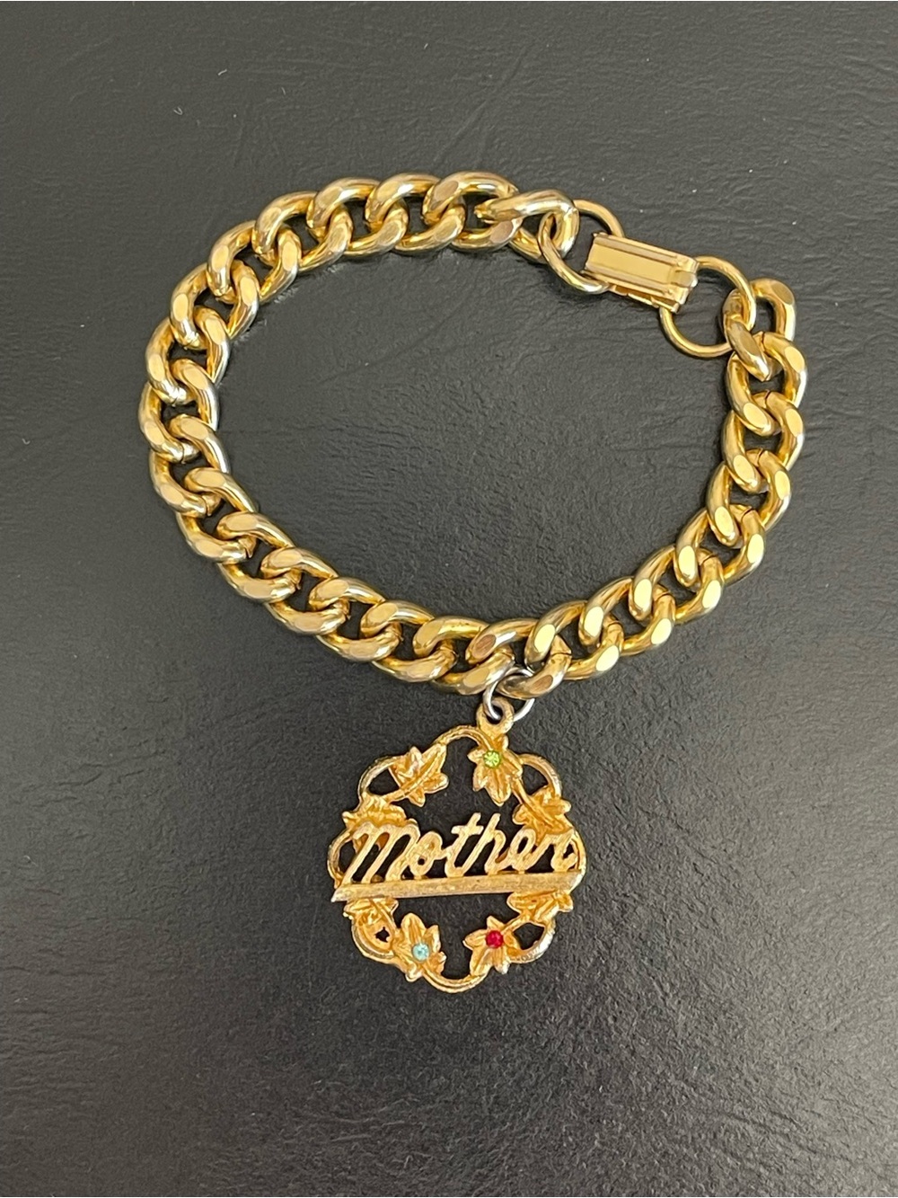 Gold Tone 'Mother' Charm Curb Chain Bracelet.